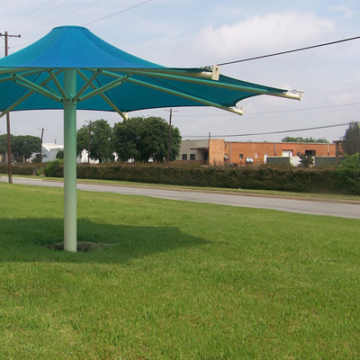 Shade structures like canopies, in public environments, providing shade and UV protection.